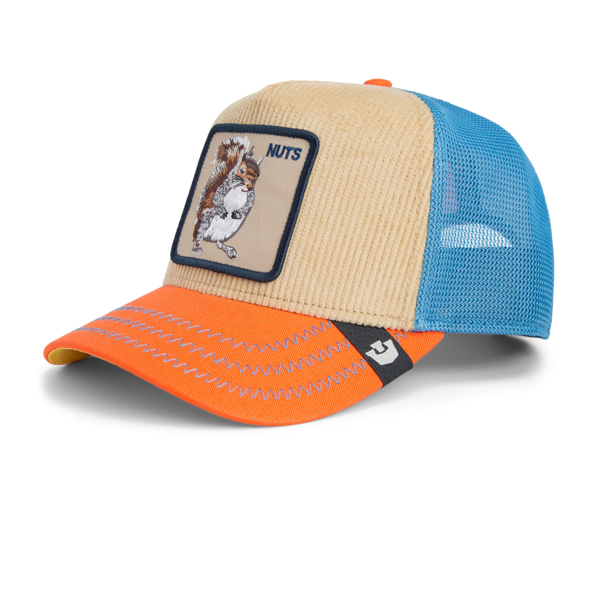 Beige, blue, and orange Goorin Bros trucker hat with corduroy front featuring embroidered squirrel patch labeled NUTS on front panel