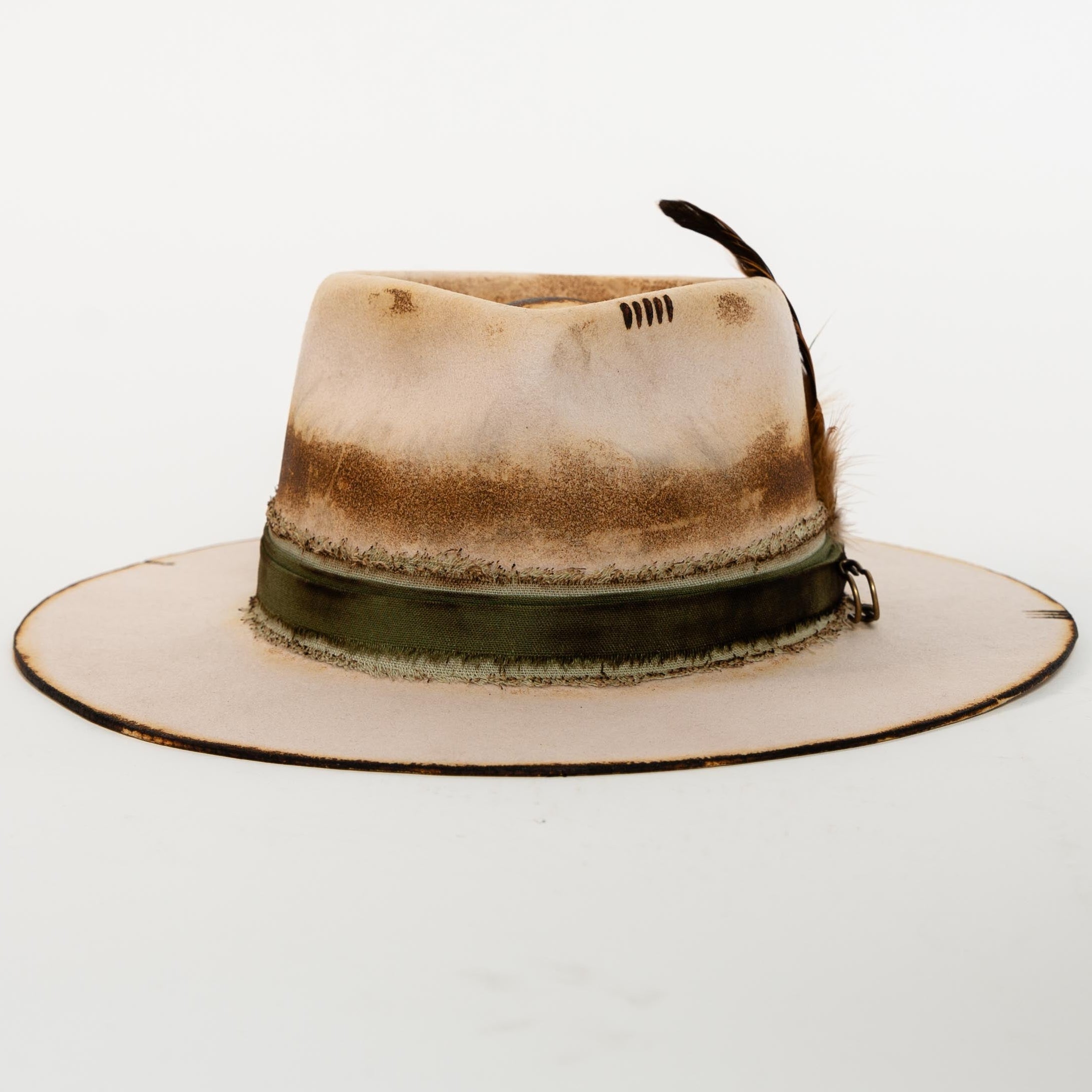 Worn-out fedora hat with a leather band on a white background