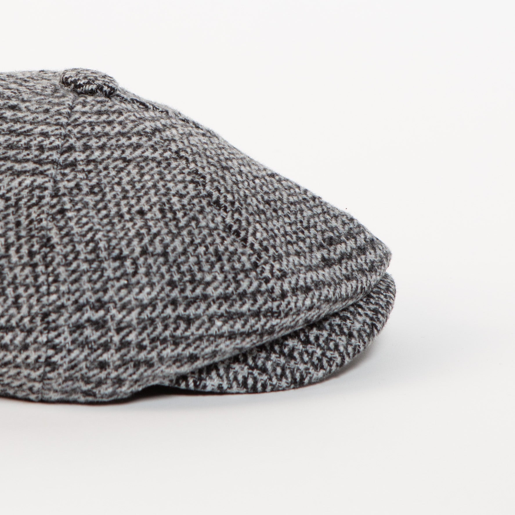 grey houndstooth newsboy cap side angle