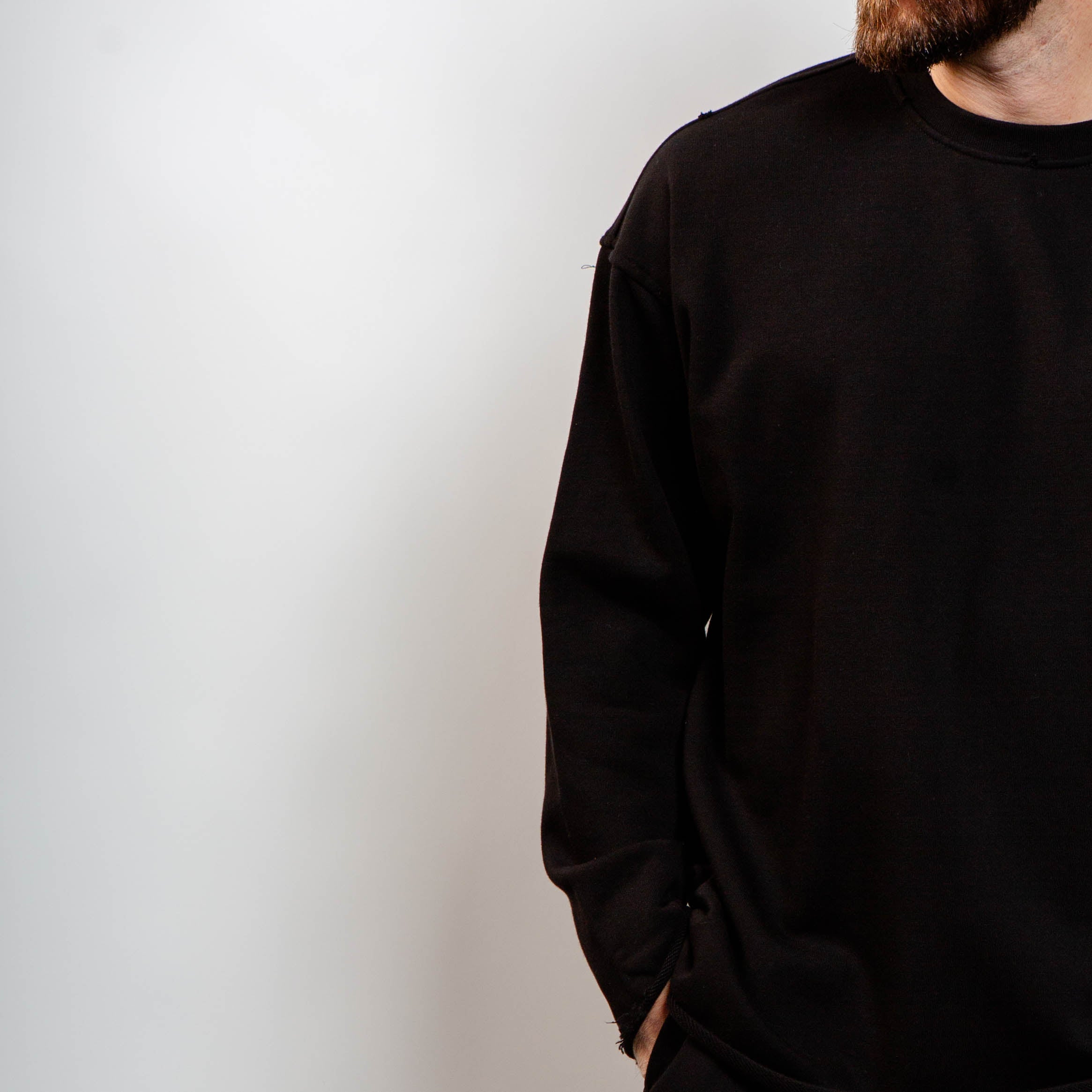 Black raw edge sweatshirt