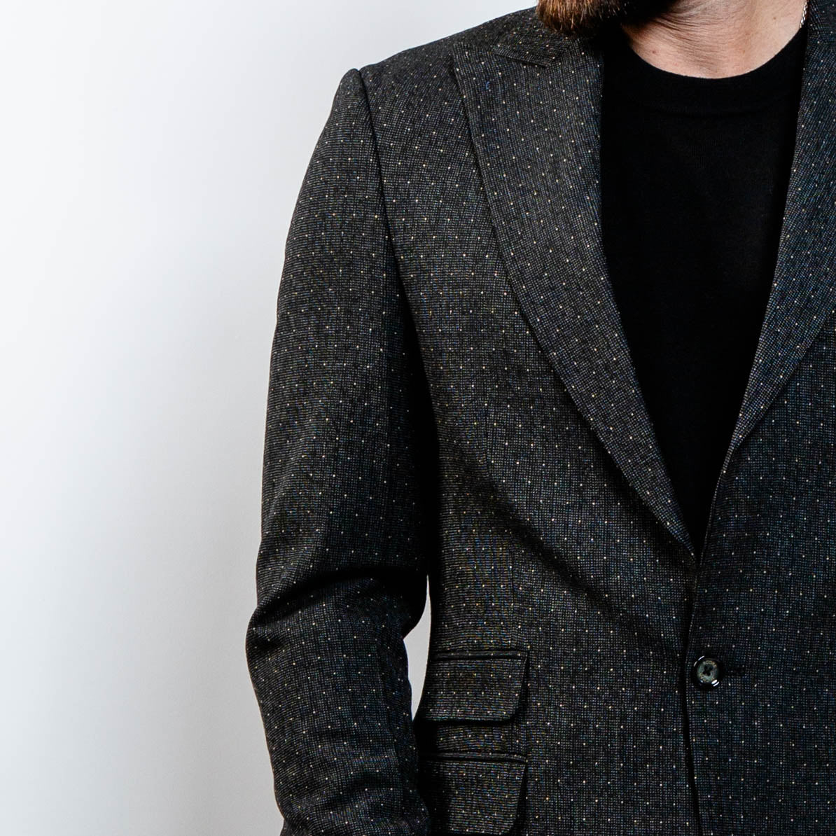 Modern charcoal blazer styled with jeans