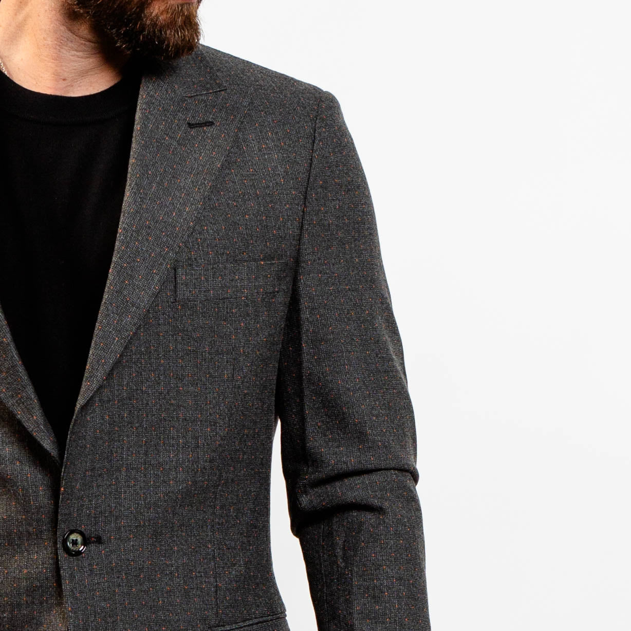 Modern charcoal blazer styled with jeans