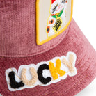 Pink bucket hat with a patch of a cat and the word 'LUCKY'