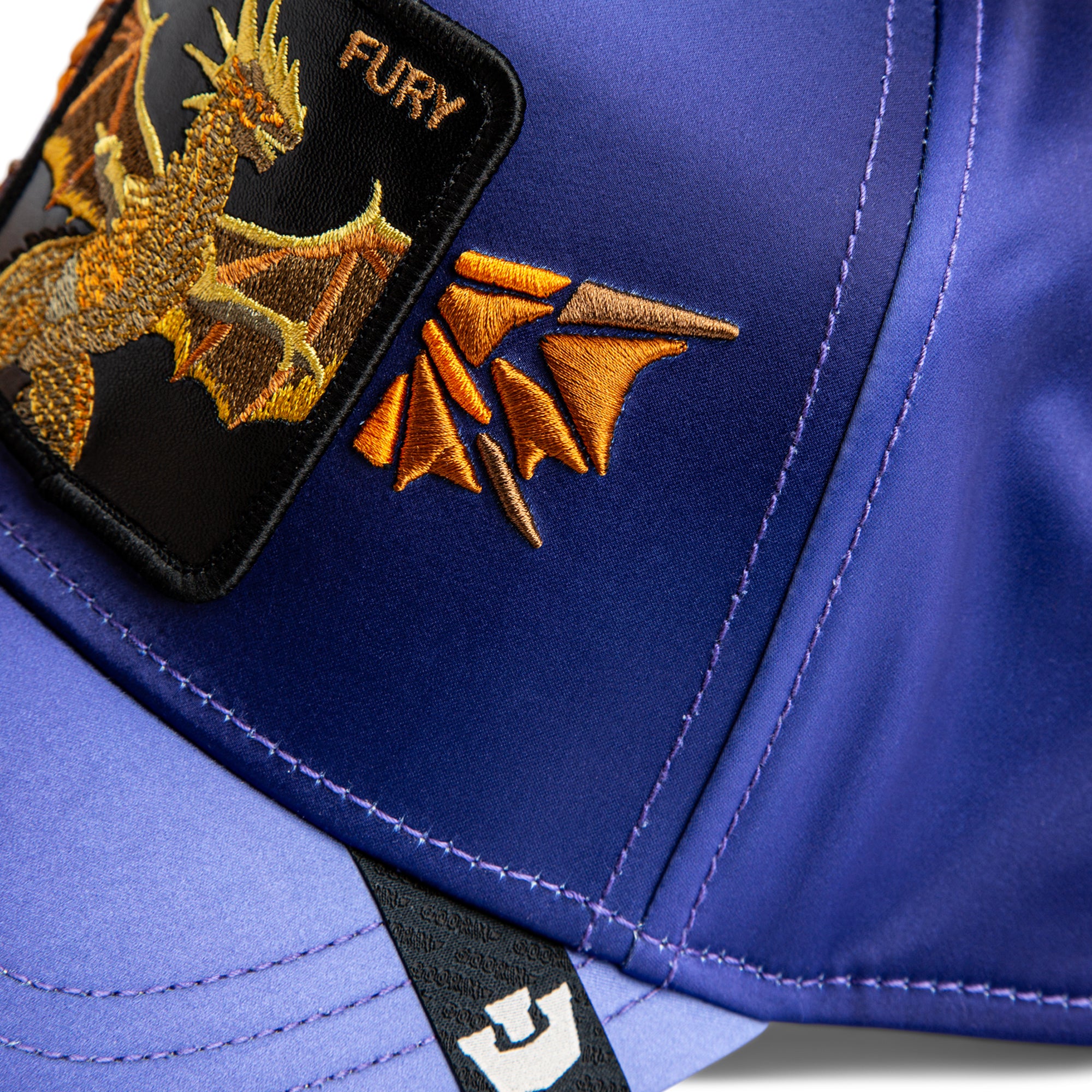 Blue helmet with embroidered dragon design and 'FURY' text