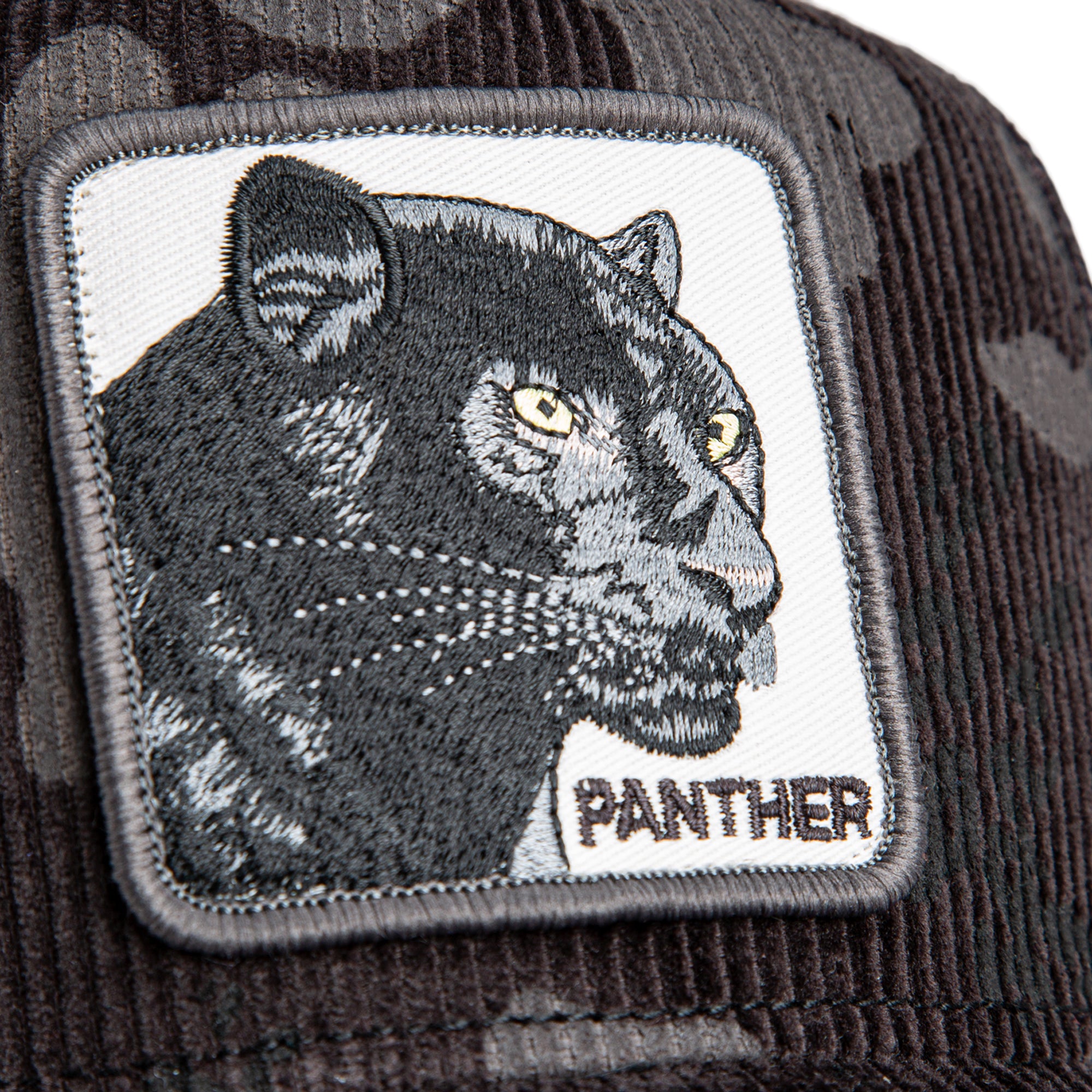 Panther patch on a camouflage cap
