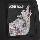 Goorin Bros Lone Wolf Trucker Hat in black with embroidered wolf patch
