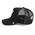 Black Goorin Bros trucker hat with mesh back featuring embroidered raccoon patch labeled BANDIT on front panel
