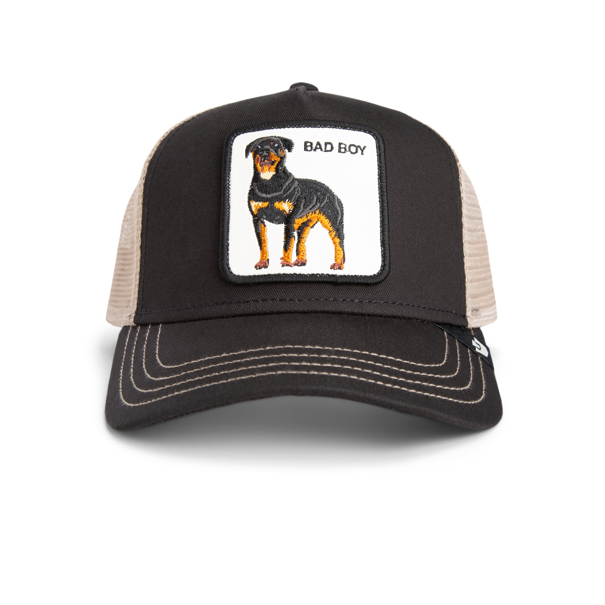 Black and beige Goorin Bros trucker hat with mesh back featuring embroidered Rottweiler patch labeled BAD BOY on front panel
