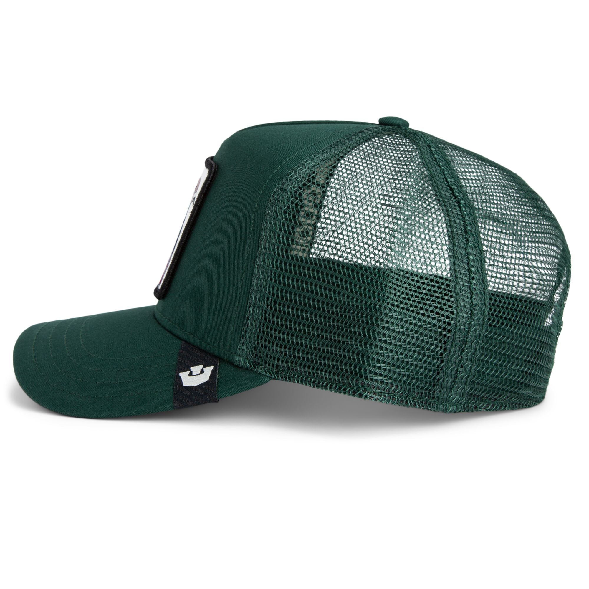 Dark green trucker cap with mesh back featuring embroidered pigeon patch labeled HOMIE on front panel
