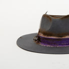 Gray fedora hat with purple band on a white background