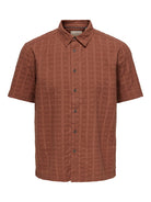 wilson brown short sleeve button up cotton shirt close up texture detail