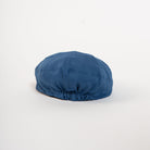 elastic back slate blue paperboy hat