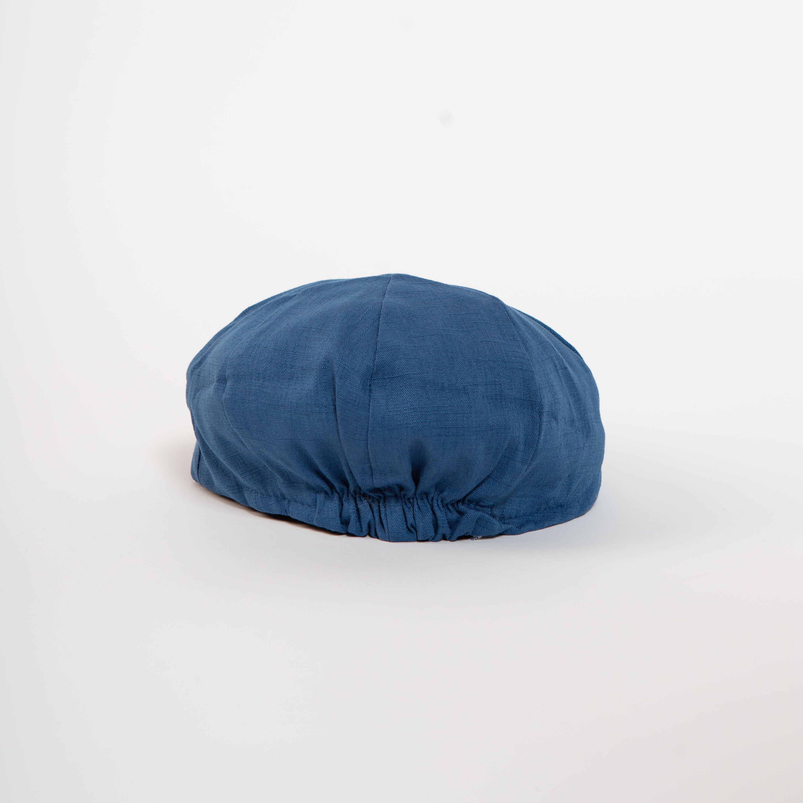 elastic back slate blue paperboy hat