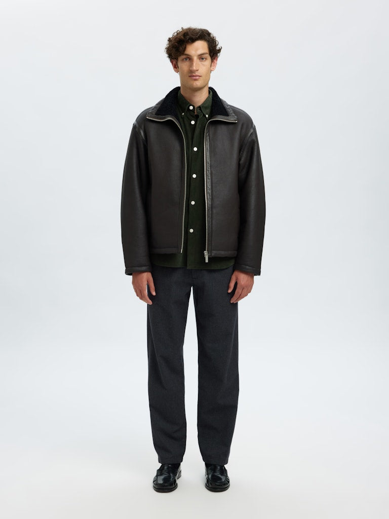 Selected Homme dark green corduroy overshirt for men, featuring button-down collar, long sleeves, and classic front button closure