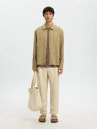 lightweight summer linen pants mens outfit beige