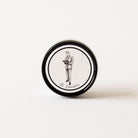 Hand poured luxury candle with illustrated lid in black metal tin