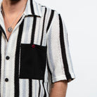 black and white striped knit shirt