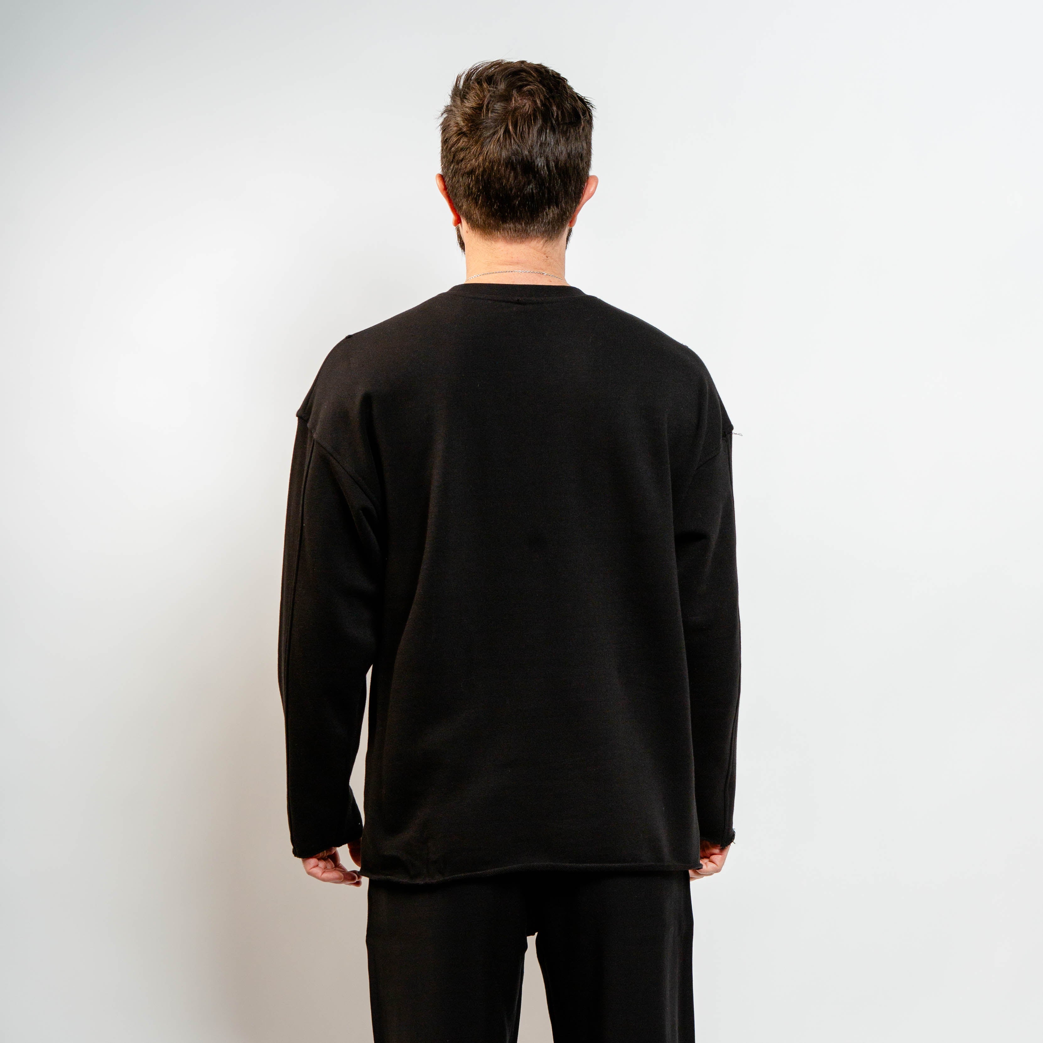 Deconstructed black sweatshirt