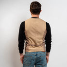 Camel and black waistcoat styled with black sweater