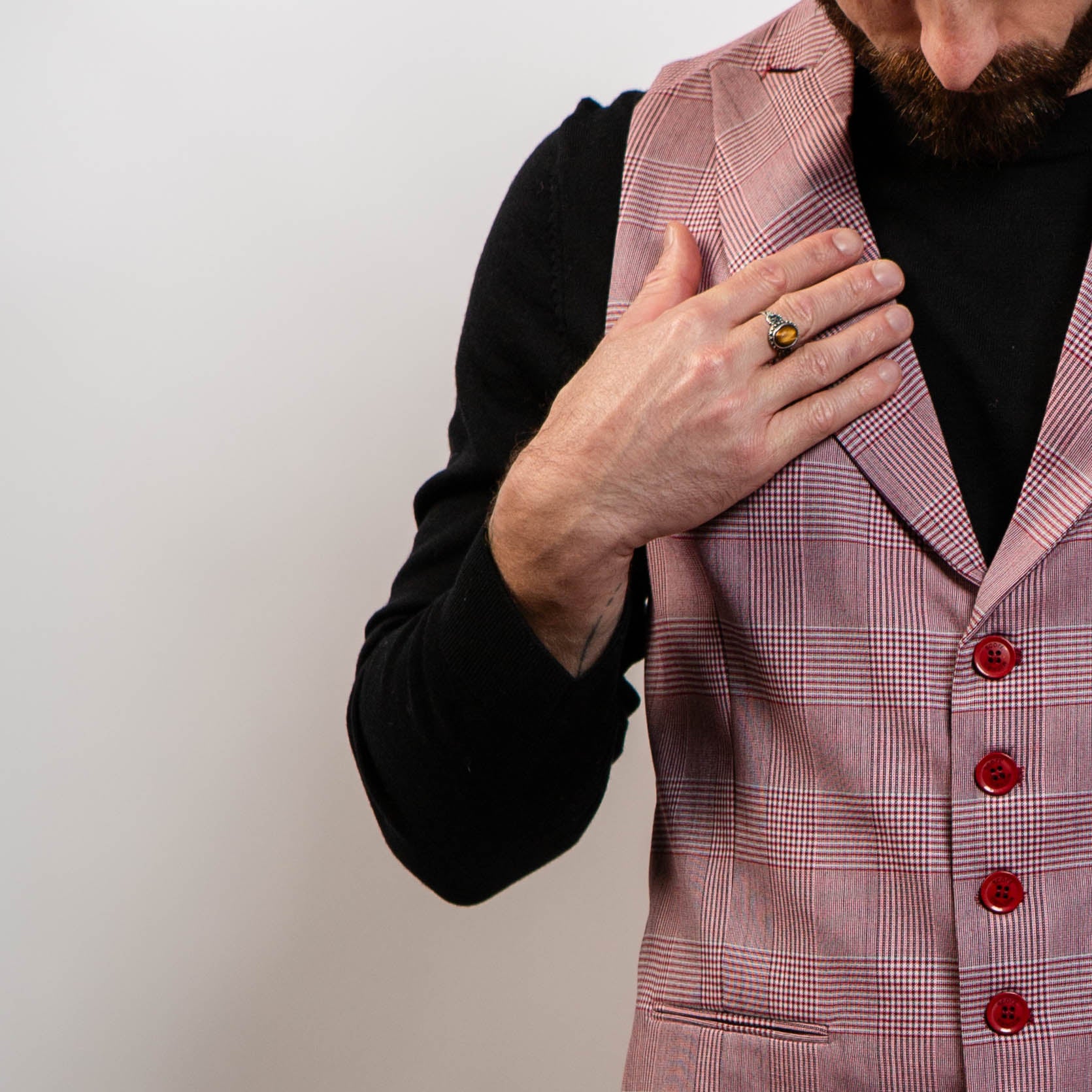 Checked cotton waistcoat styled with black sweater