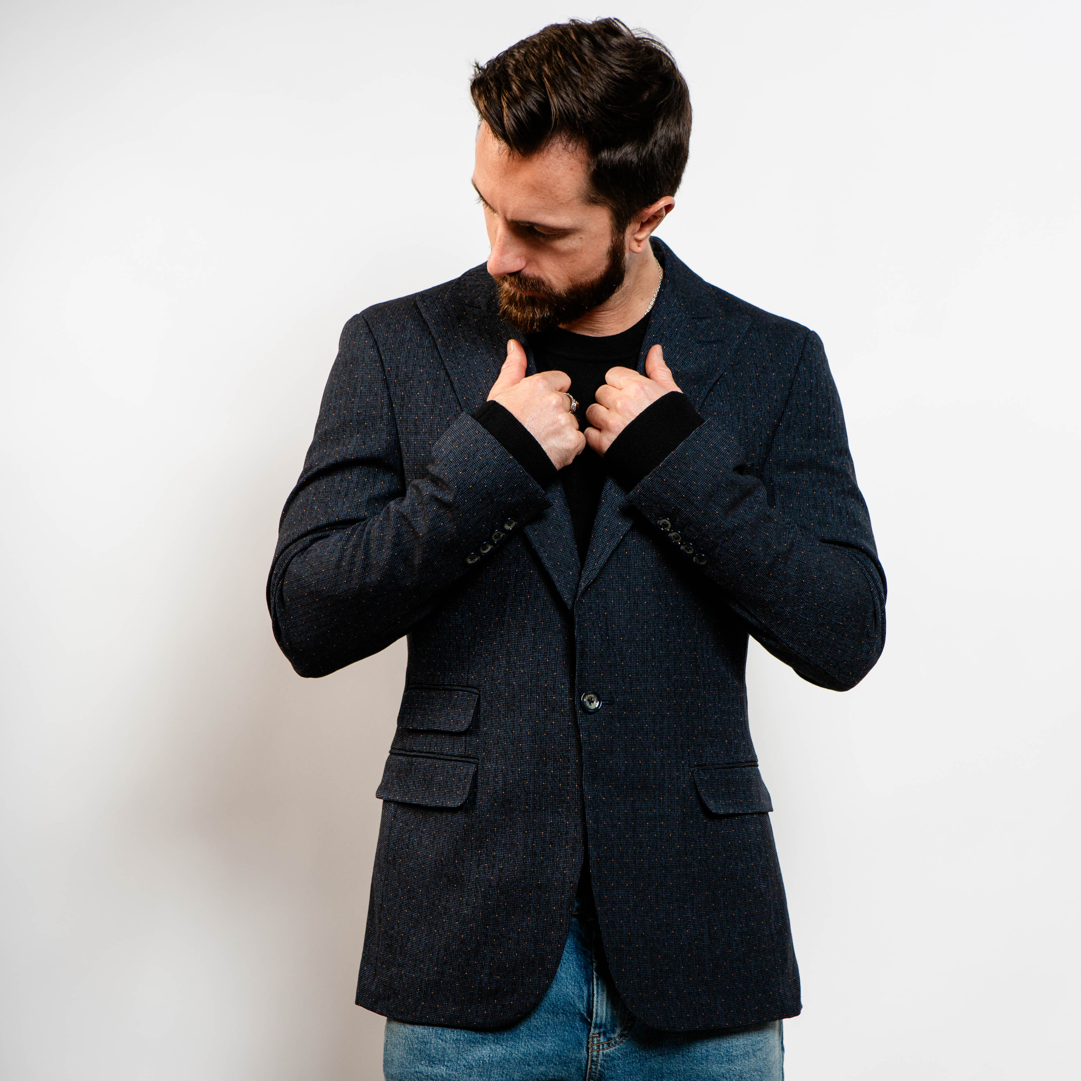 Textured navy blazer with subtle pattern