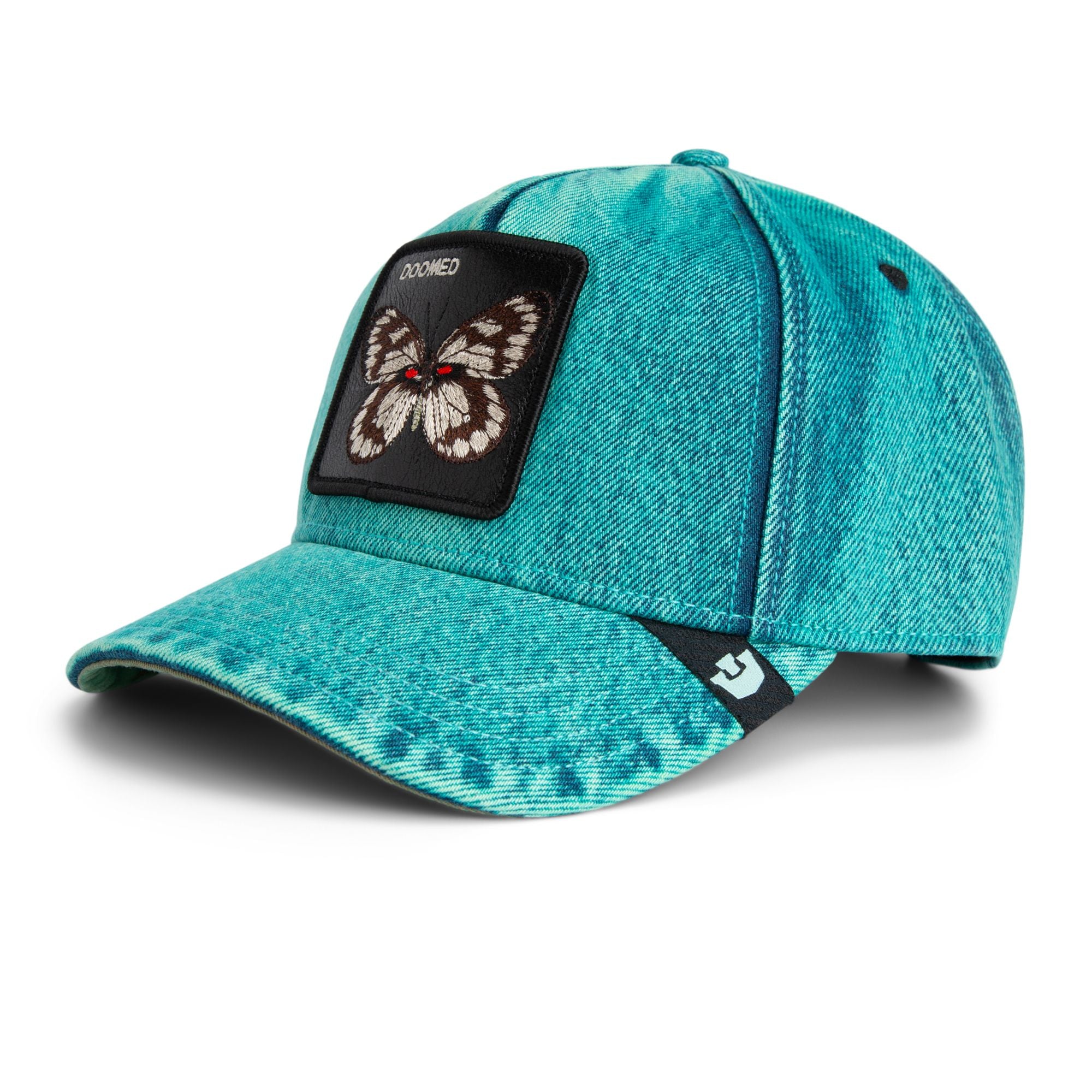 Goorin Bros Doomed Butterfly Trucker Hat in teal denim with embroidered butterfly patch
