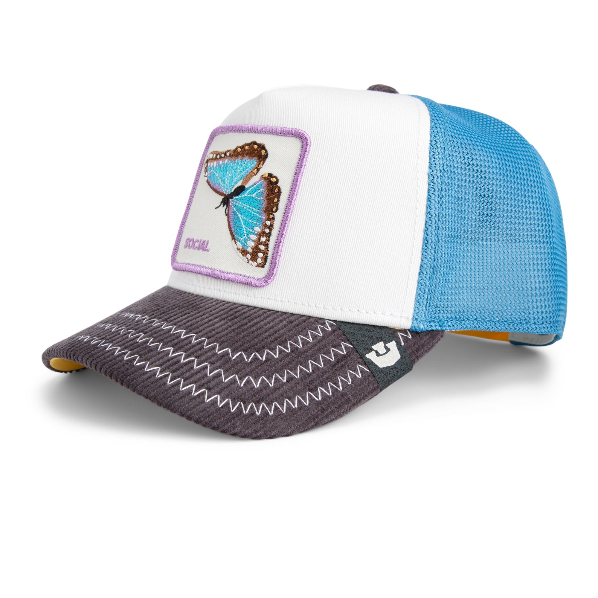 White and blue Goorin Bros trucker hat with grey brim featuring embroidered butterfly patch labeled SOCIAL on front panel
